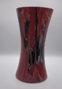 tall red marble vase