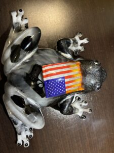 black resin frog with flag